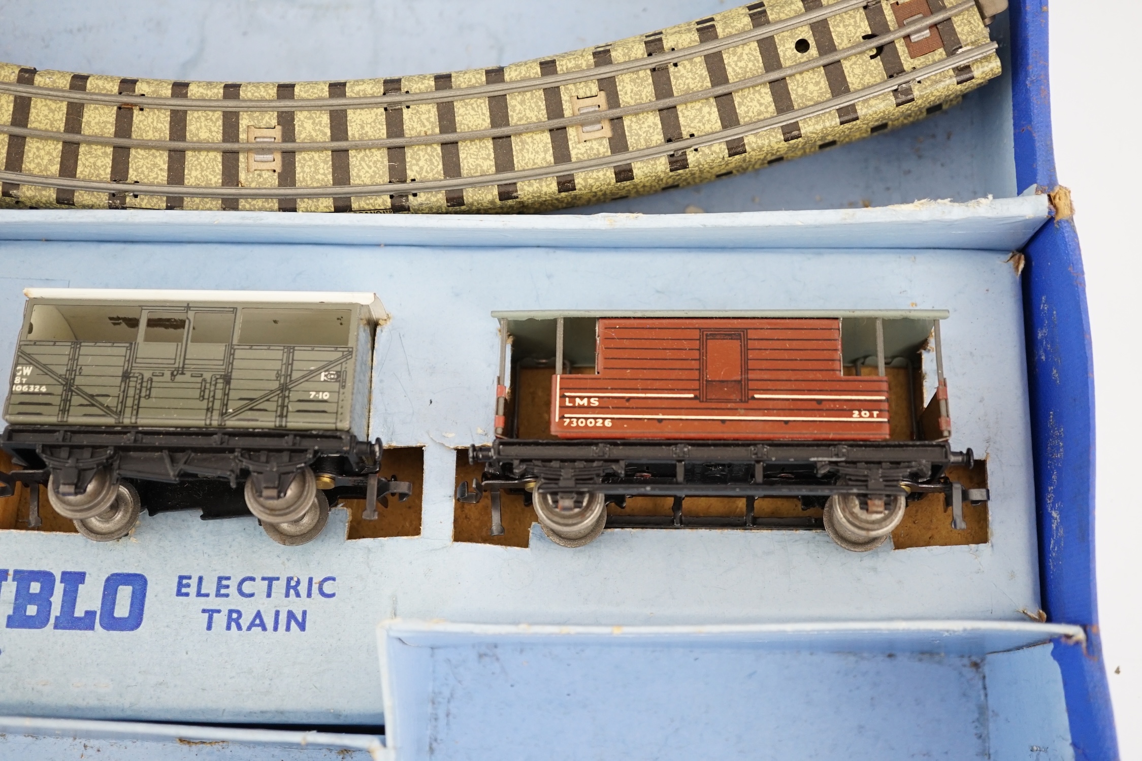 A collection of Hornby Dublo railway for 3-rail running, including; a boxed EDG7 Tank Goods Train set comprising an LMS Class N2 0-6-2 locomotive, 6917, freight wagons and track sections